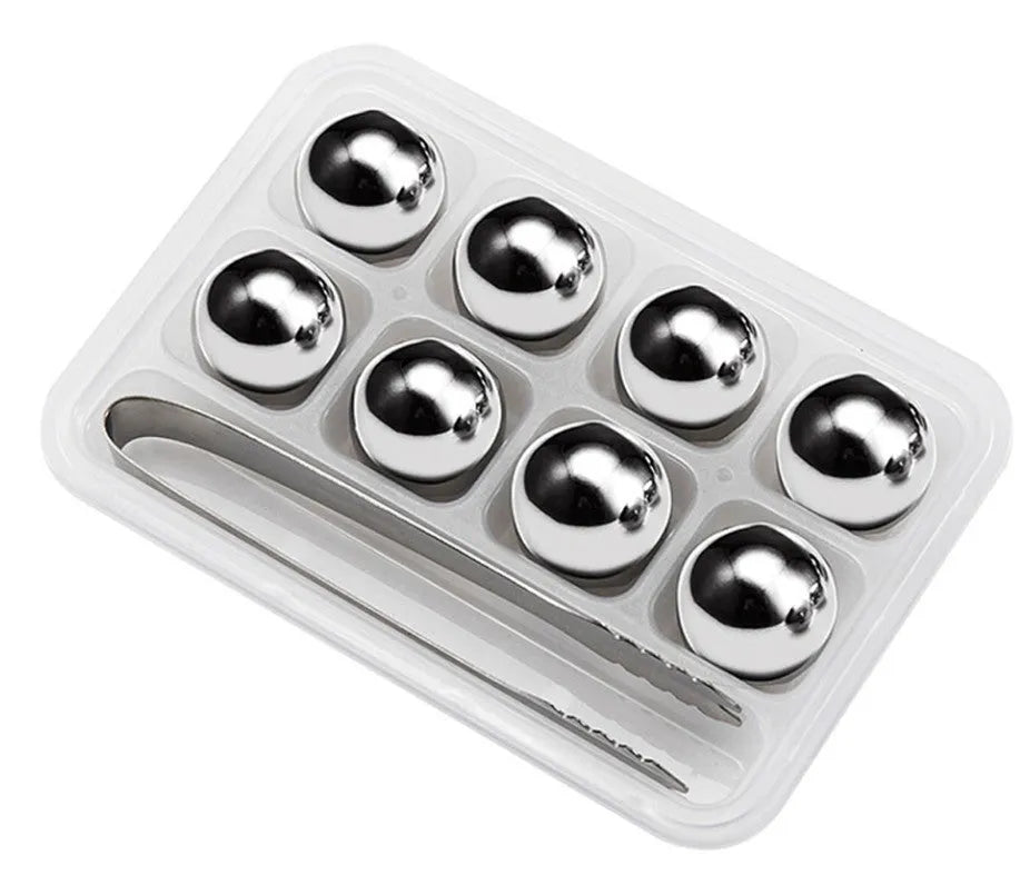 Set of eight stainless steel whiskey cooling stones with metal clip in plastic storage container