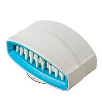 Blue kitchen brush with utensil slots and suction cup for fruit and vegetable cleaning