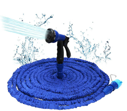 Expandable flexible water hose with spray gun showing green colour and extended length with water spraying in cone pattern