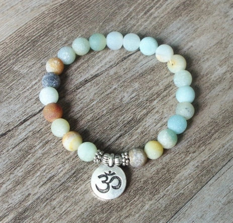 Handmade Matte Amazonite Beaded Charm Bracelet with OM Lotus charm for spiritual and fashion purposes