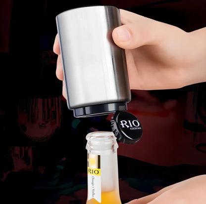 Stainless steel automatic press bottle opener with titanium-plated finish showing press mechanism and textured handle