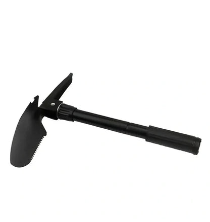 Military folding shovel extended to 40cm with pick end and saw blade visible