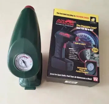 Portable car tyre pump with digital display showing pressure reading, connected to tyre valve