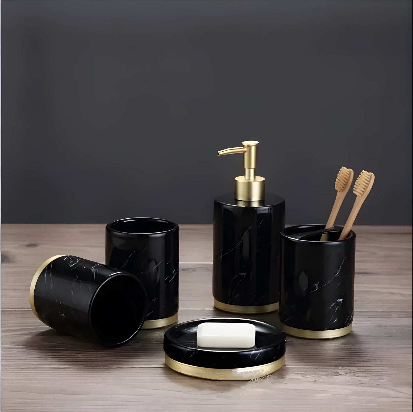 Ceramic bathroom set with bright glaze showing emulsion bottle, cup, toothbrush holder and soap dish