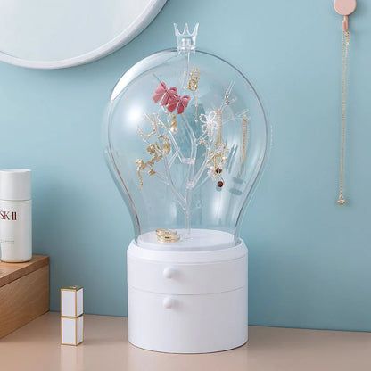 Rotating jewelry organizer with LED lights and USB charging for necklaces, earrings, and makeup storage