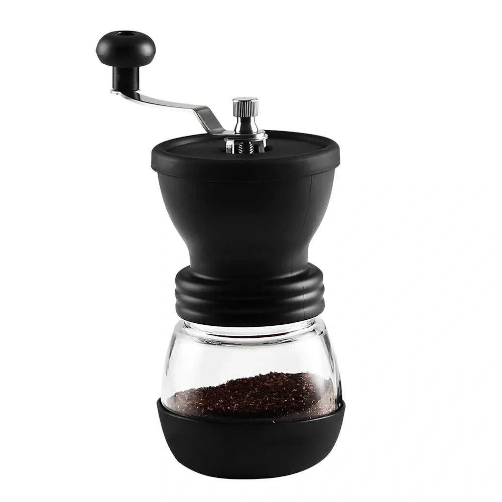 Manual coffee grinder with beech wood body and stainless steel grinding mechanism on kitchen counter