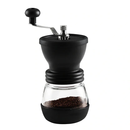 Manual coffee grinder with beech wood body and stainless steel grinding mechanism on kitchen counter
