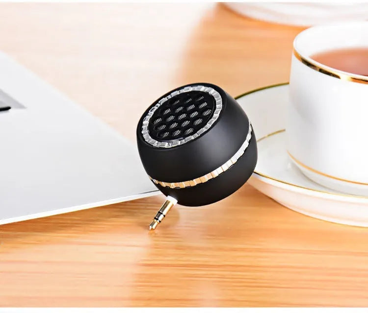 Universal external amplifier speaker in black, rose gold, and local gold colours with 5V power input.