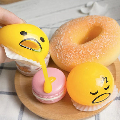 Gudetama Vomiting Egg Toy in green, orange, pink, and yellow for stress relief and fun
