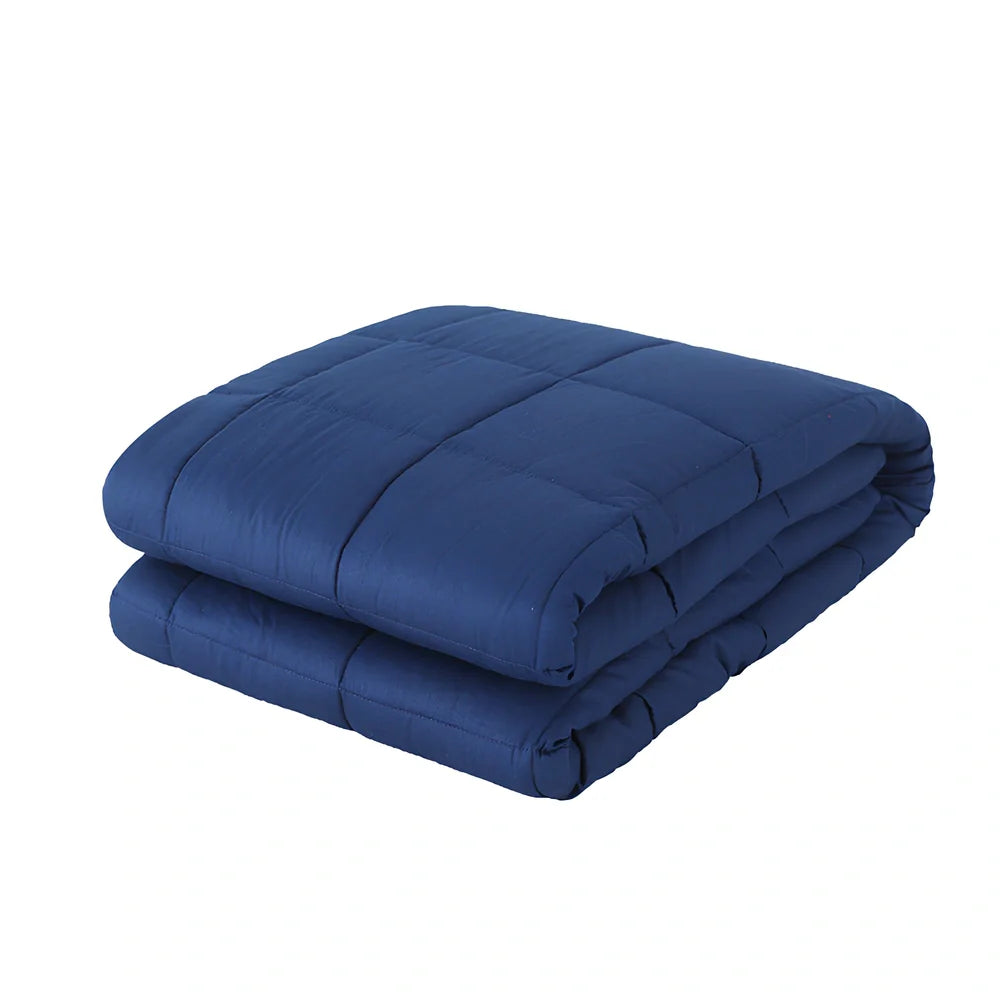 Weighted blanket with quilted compartments containing glass beads, available in dark grey, light grey, and navy colours