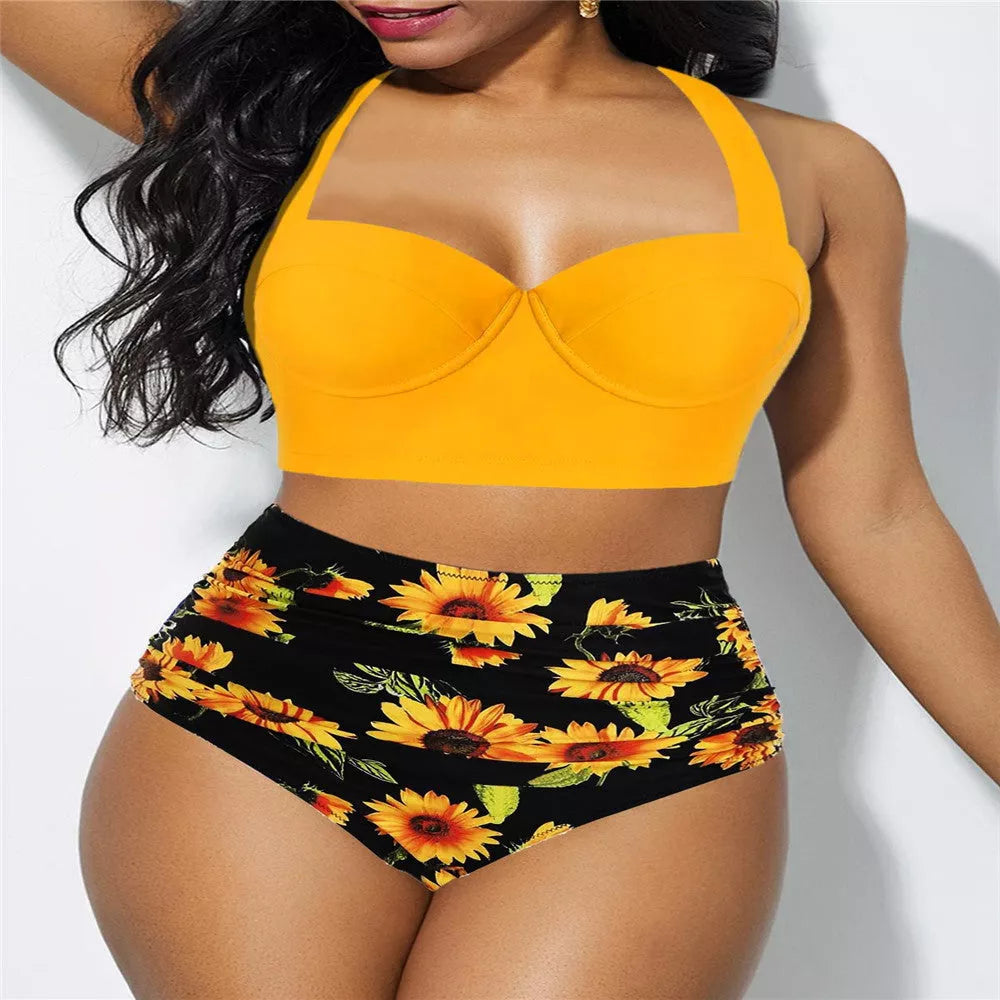 High-waisted plus-size swimsuit with yellow and black floral patterns