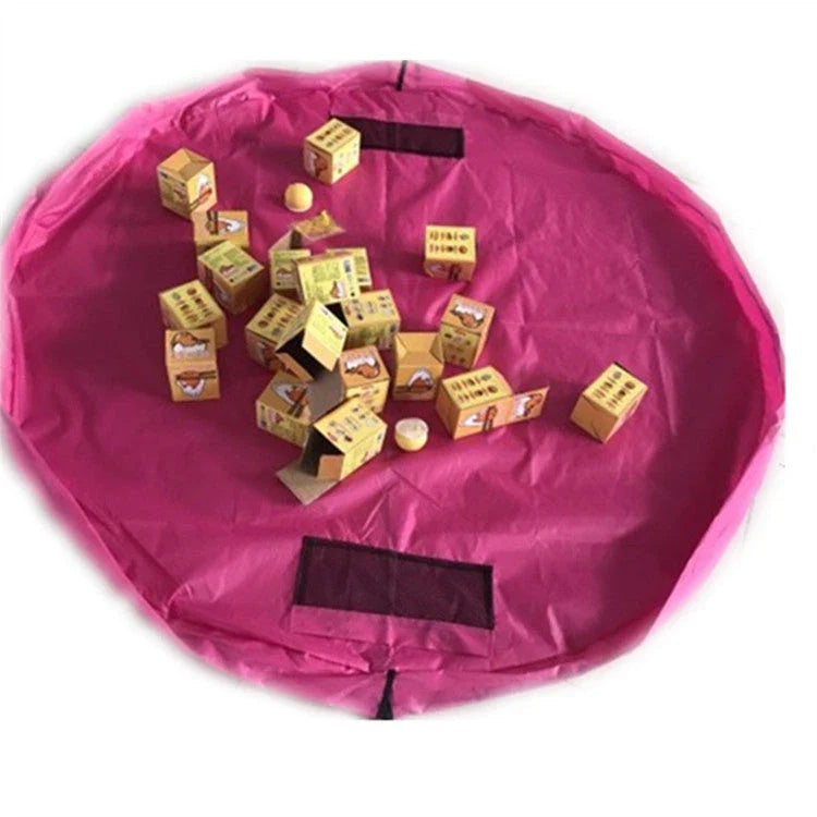 A large, waterproof travel picnic mat made of durable nylon with convenient toy storage bags for outdoor adventures.