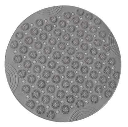 Textured round shower mat with anti-slip surface, massage nodules, and drainage holes for a comfortable and safe bathing experience