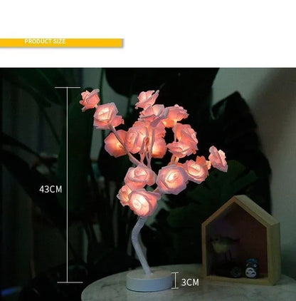 White and red rose flower LED lamp on a bonsai tree stand with warm white lights.