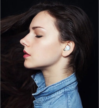 Black and white M18 true wireless in-ear Bluetooth earbuds with charging case.