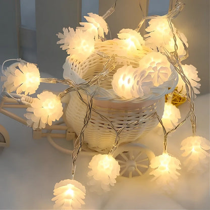 LED pine cone decorative light string with warm white illumination and battery operation