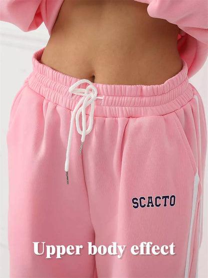 Women's casual printed top and pants set in polyester, available in black, pink, and purple