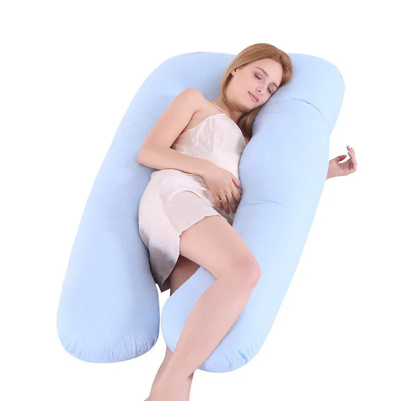 Large U-shaped pregnancy support pillow with removable cover and abdominal support belt.