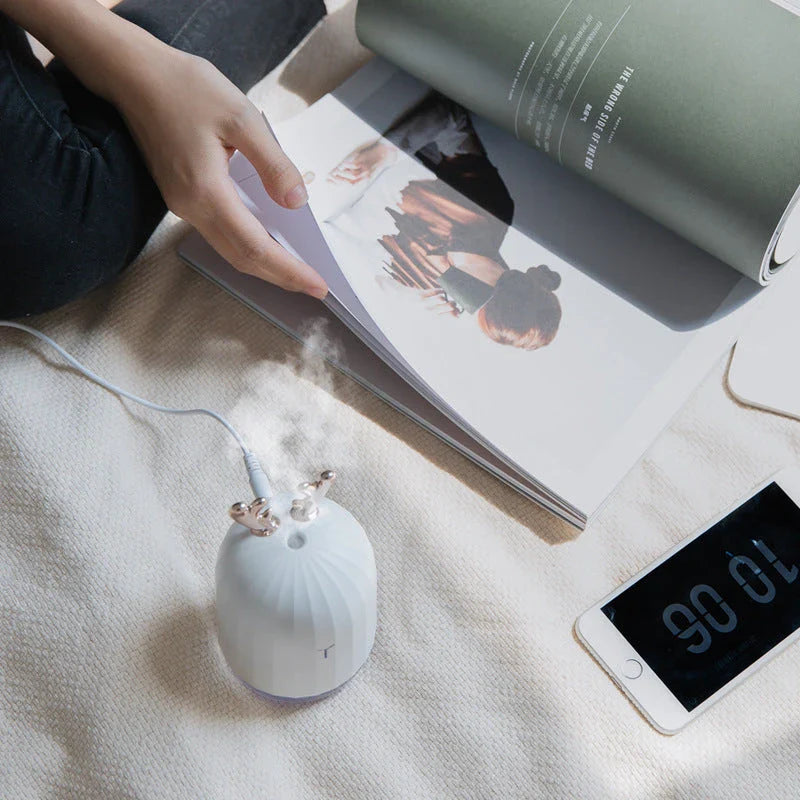 Compact deer-shaped humidifier with USB power for small spaces up to 100 square feet