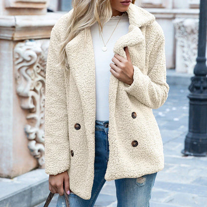 Cozy and stylish fluffy winter coat for women, made of premium polyester fiber for warmth and comfort.