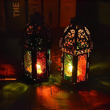 Wrought iron candle holder with 16cm height and 7cm diameter in black finish showing hanging design