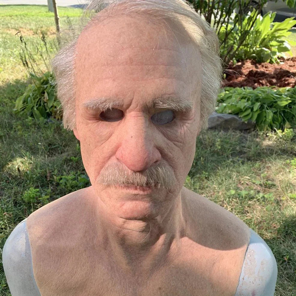 Latex old man Halloween mask with white hair and beard showing realistic facial wrinkles