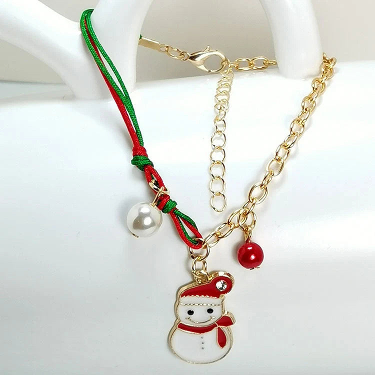 Charming Christmas bracelet with festive charms like Santa, snowmen, and snowflakes