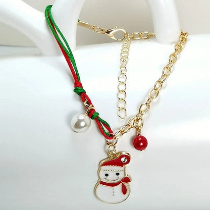Charming Christmas bracelet with festive charms like Santa, snowmen, and snowflakes