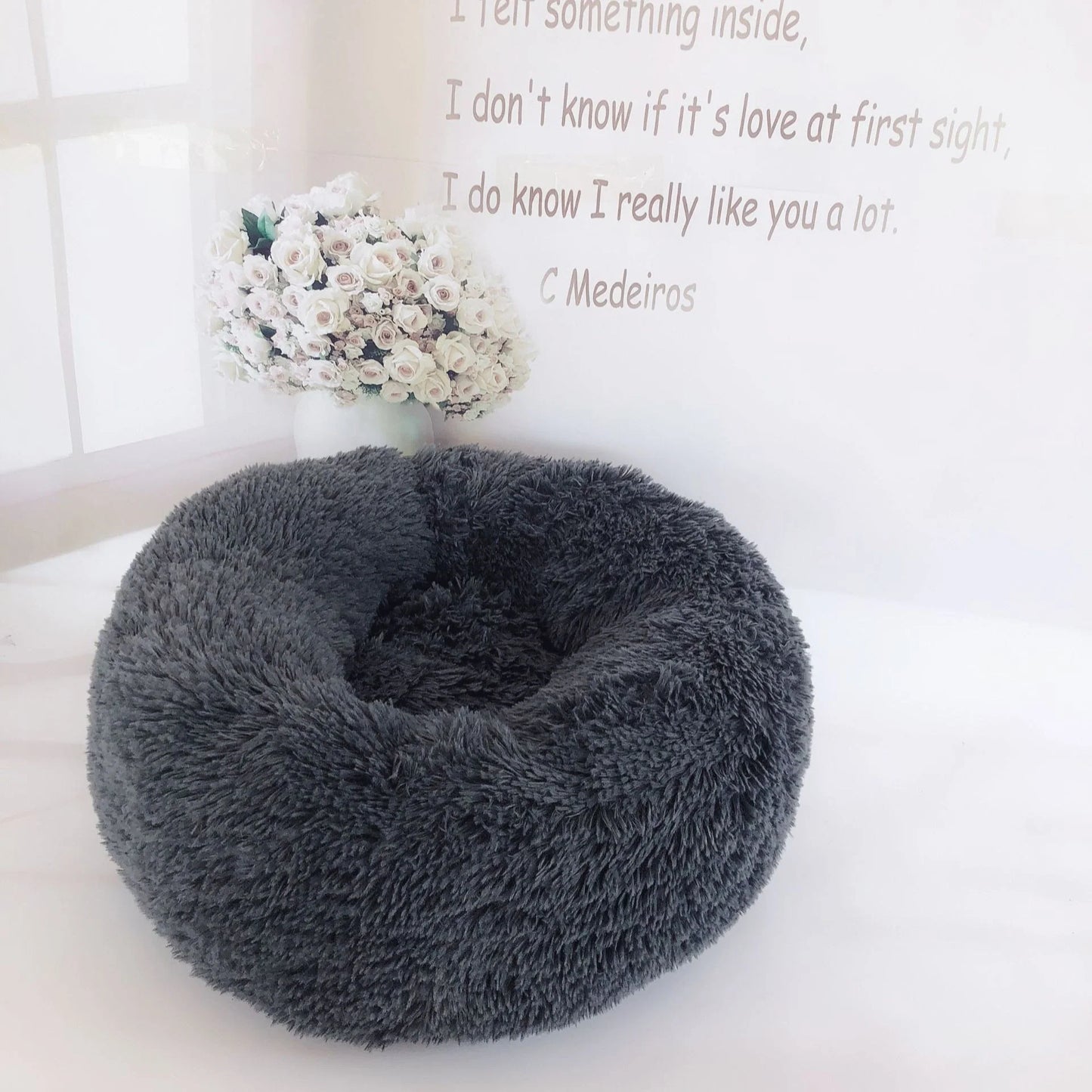 Cozy plush pet nest in various colors and sizes for ultimate pet comfort