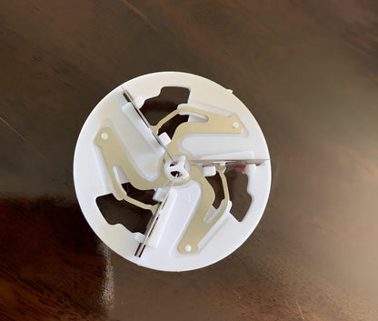 White rechargeable lint remover with detachable head and USB charging cable