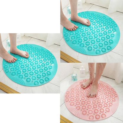 Textured round shower mat with anti-slip surface, massage nodules, and drainage holes for a comfortable and safe bathing experience