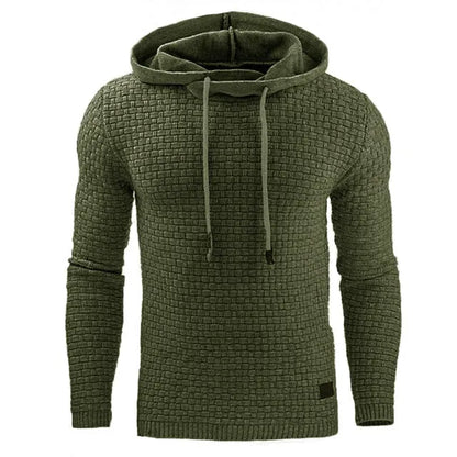 Man wearing a cotton-polyester blend hooded sweatshirt in grey, showing the front design and hood.