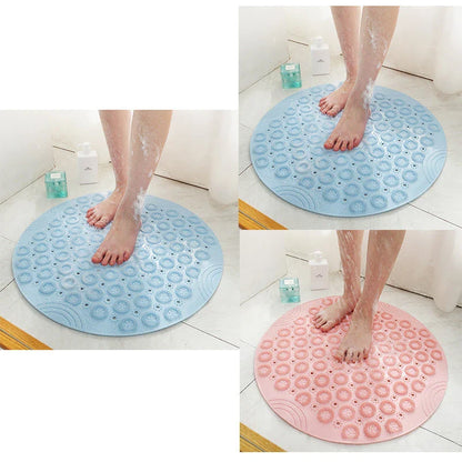 Textured round shower mat with anti-slip surface, massage nodules, and drainage holes for a comfortable and safe bathing experience
