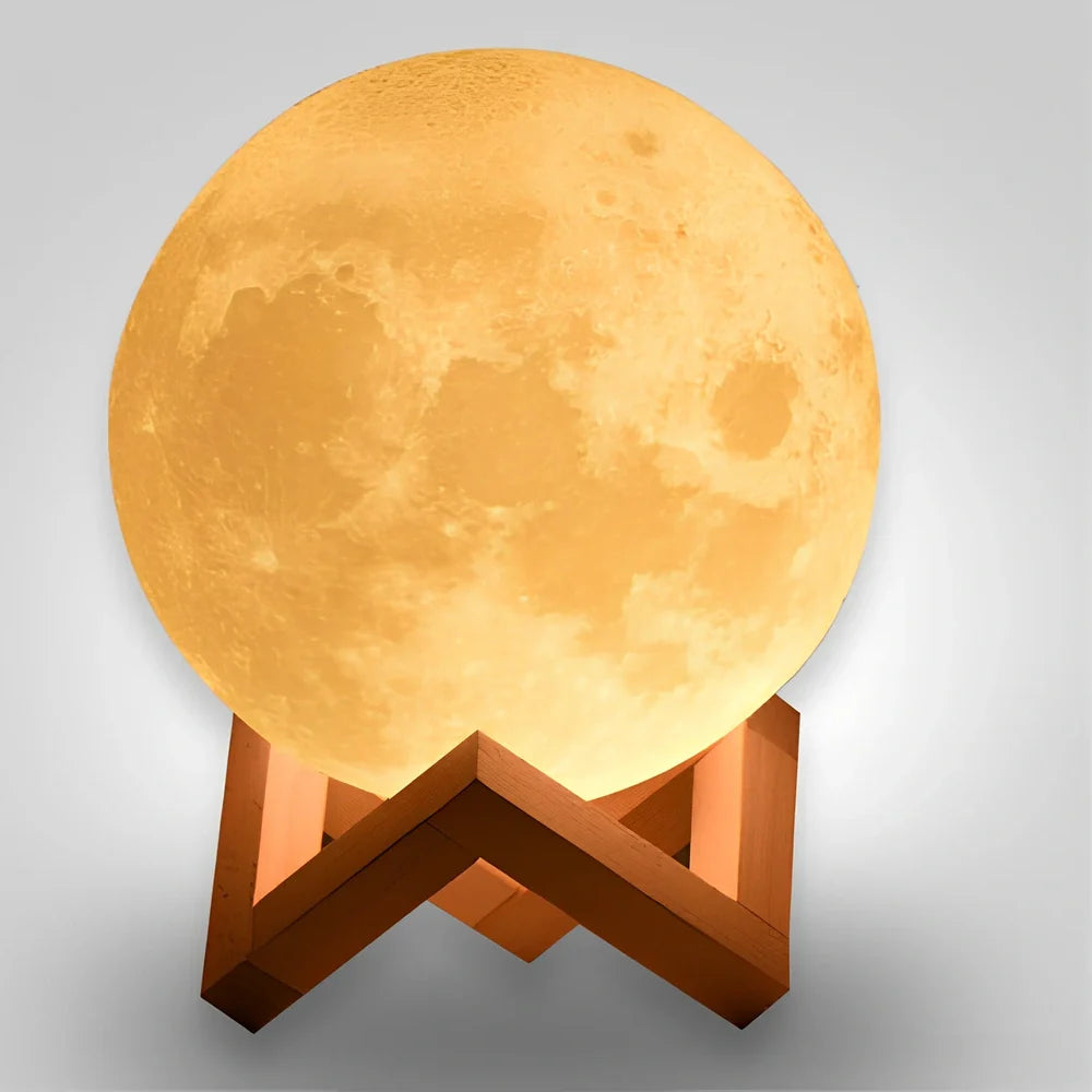 3D printed moon night light with detailed lunar surface and dual-colour LED lighting on beech wood stand