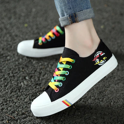 Classic canvas shoes in black and blue colours with lace-up closure and rubber sole
