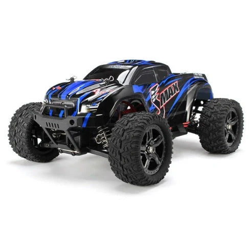 Blue REMO 1631 1:16 scale 4WD RC truck with transmitter on rough terrain