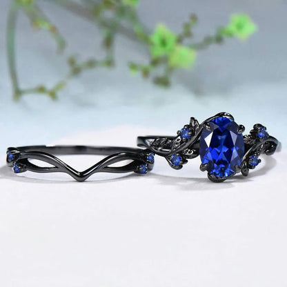 Geometric gun black couple ring with navy blue rhinestones on copper base