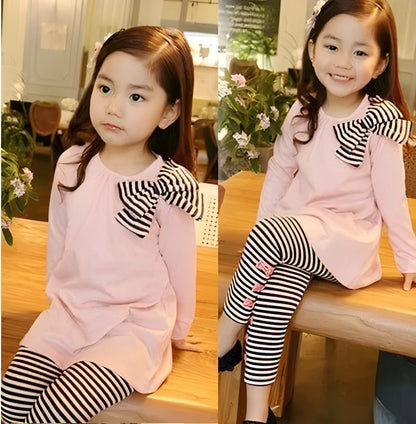 Pink cotton girls clothing set shown in sizes for child heights 110cm to 140cm.
