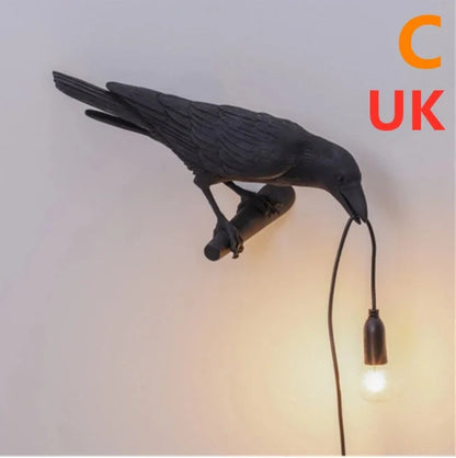 Elegant Resin Bird Wall Lamp illuminating a cozy room with its unique design