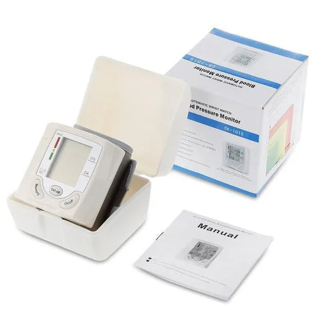 Grey wrist blood pressure monitor with compact design and digital display