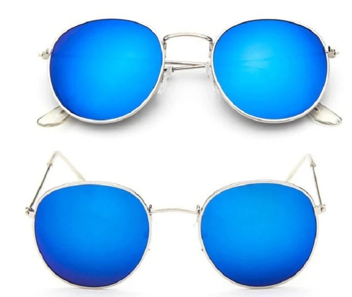 Stylish women's retro sunglasses with round frame and metal finish