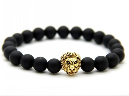 Carved stone bracelet featuring a powerful lion design, meant to enhance confidence and style.