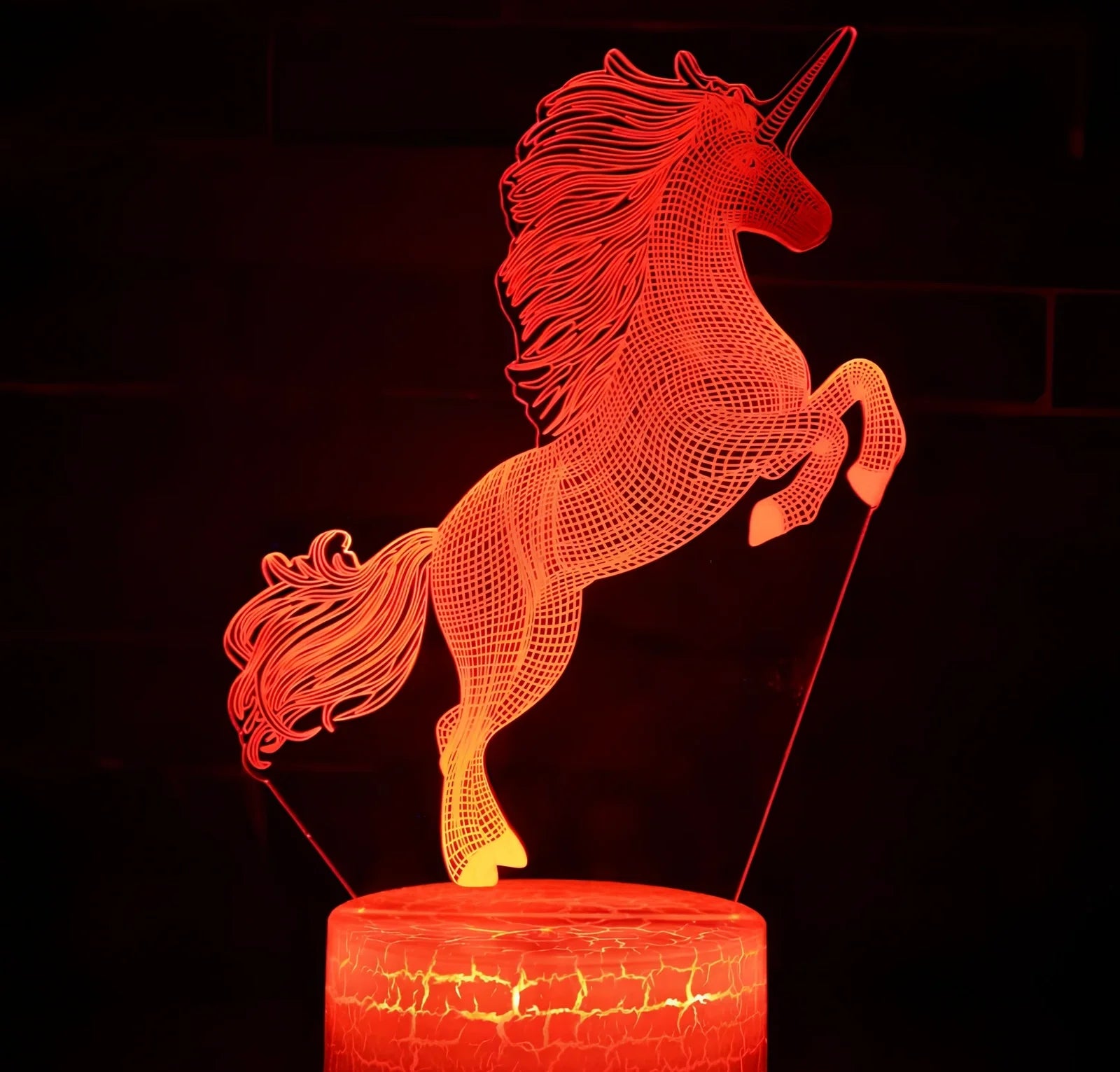 3D unicorn night light with LED illumination on 23cm black ABS base, showing touch controls and USB cable