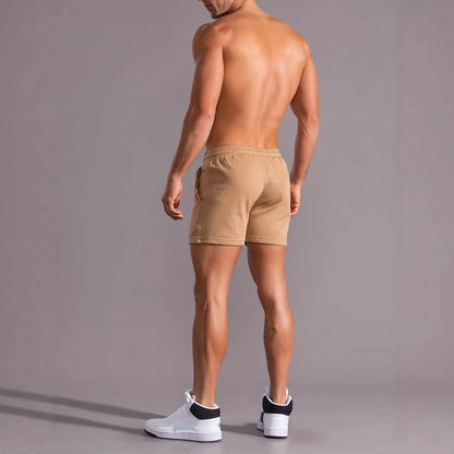 Khaki coconut print men's sports shorts with elastic waistband and straight leg design