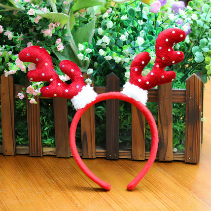 Adjustable Christmas headband with plastic buckle and flannel lining in festive designs
