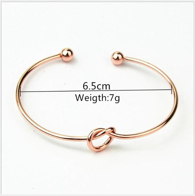 Elegant Knot O-Type Metal Openwork Bracelet with unique design for stylish women