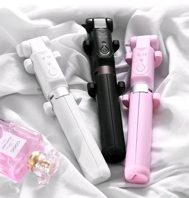 A Bluetooth selfie stick with a tripod stand and remote control, made from aluminium alloy, extending to 85cm for stable group photos and videos with iPhone and Android phones.