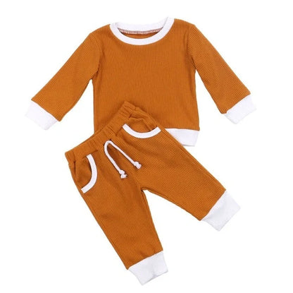 Girls' linen jacket and trousers set in brown, green, pink, or white, sizes 6M to 4T