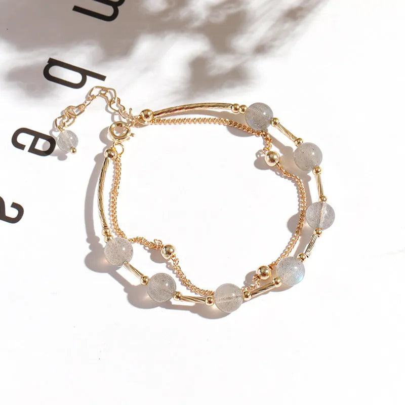 Women's electroplated crystal bracelet with moonstone charm and double copper tube design
