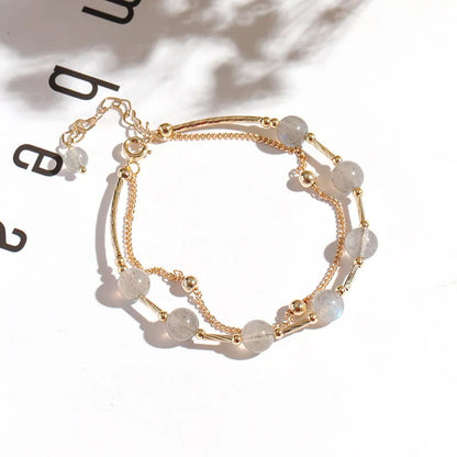 Women's electroplated crystal bracelet with moonstone charm and double copper tube design